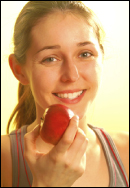 Girl holding apple